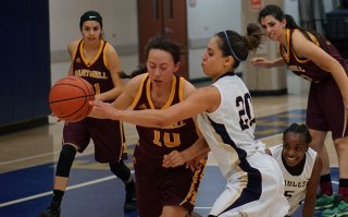West Hills Taylor Vasquez goes for the ball against Hartnell College Friday night in the WHC Golden Eagle Arena.